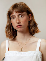 Femme Pendant in Gold