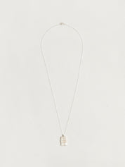 The Kiss Necklace in Sterling Silver